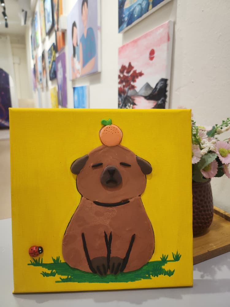 DIY coin box painting activity for kids at ArtZ Club