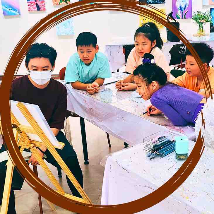 Art class with children painting together.